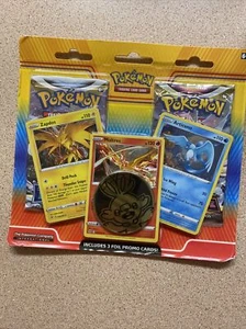 Pokémon Trading TCG mit Metallmünze - Bild 1 von 2