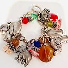 Elephant charm bracelet with beads and elephants. Silver color. 7.5” long