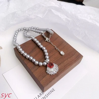 New In GIft Box Hyperbola pendant with staggered circles, red, rhodium plated - Image 1 of 3