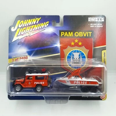 JOHNNY LIGHTNING BISHOP 1980 TOYOTA LAND CRUISER FJ40 PAM OBVIT W/ BOAT TRAILER - Image 1 of 4