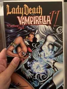 LADY DEATH VS VAMPIRELLA #2 PREVIEW! SIGNED - 9.4 NEAR MINT - Picture 1 of 3