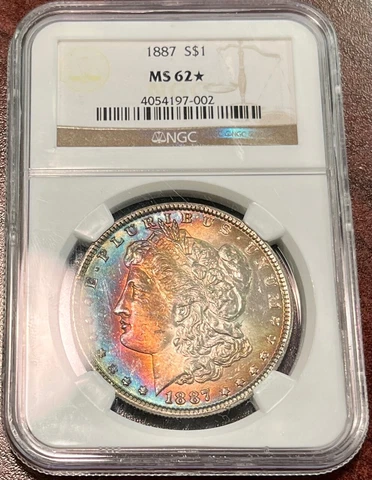 Genuine 1887 NGC MS62 Star Morgan Silver $1, Brilliant Rainbow Toning! Cover