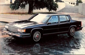 Postcard Cadillac Sedan DeVille 4 Door Navy Blue 1987 - Picture 1 of 2