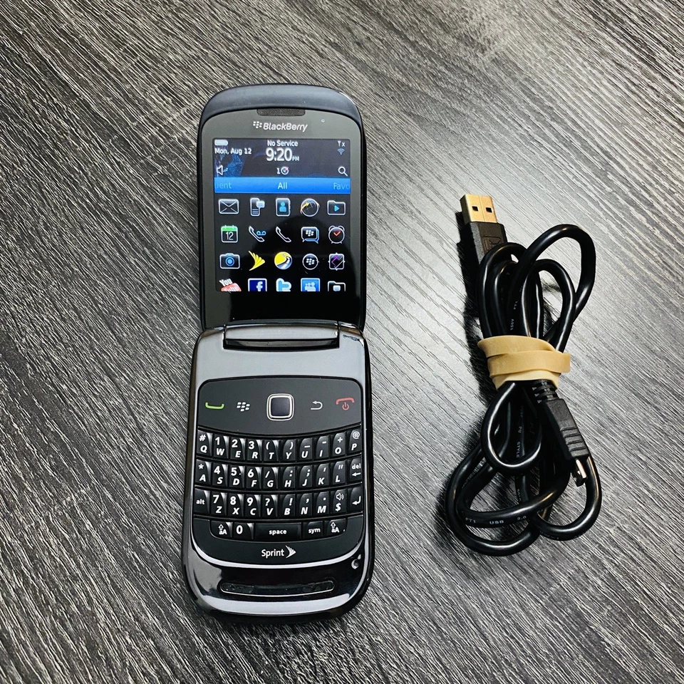 BlackBerry Style 9670 Flip Phone (Sprint) Black & Grey Chrg Cord & Battery - Image 1 of 4