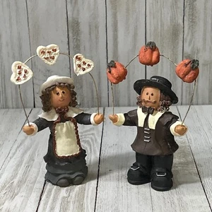 Vtg 2 Resin Thanksgiving Pilgrims Man Woman Holding Pumpkins Hearts Figurines - Picture 1 of 8