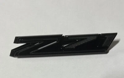 Chevrolet Silverado 1500 Z71 2019-2025 emblema para parrilla OEM negro brillante nuevo GM Foto 1 de 4
