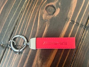 LLAVERO/LLAVERO PARA MERCEDES-BENZ AMG LOGO COLOR ROJO ML/E/C/CLK/SLK/SL/CL - Imagen 1 de 1