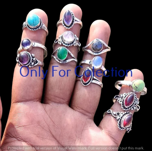 Лот ювелирных изделий кольца из серебра 925 пробы со светящимся аметистом и смешанными драгоценными камнями - Изображение 1 из 3