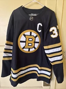 Neu mit Etikett Adidas Boston Bruins Hockey Trikot schwarz gold Patrice Bergeron 100th Größe 52 - Bild 1 von 3