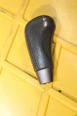 Nissan Armada Infiniti QX56 2004-2007 palanca de cambios OEM gris oscuro Foto 1 de 3