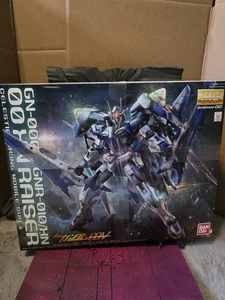 Bandai Gundam 1/100 MG 00 GN-0000+ GNA-010 OO 00 XN Raiser Model Kit - Picture 1 of 5