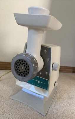 Molinillo eléctrico de carne y alimentos Oster Imperial de colección modelo 946-08E funcionando Foto 1 de 4