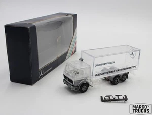 Herpa MB NG box truck transparent "Das integrale Antriebskonzept" 1:87 /H23296 - Picture 1 of 1