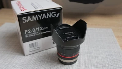 Samyang 12mm f/2 Lens – Micro Four Thirds (MFT) Perfect Condition – Boxed  - Image 1 of 4