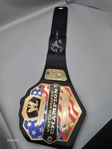 Cintura giocattolo WWE autografata Ric Flair. 16x Campione Stati Uniti - Foto 1 di 5