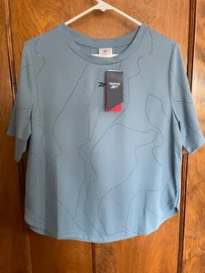 Prenda para el torso Reebok Nuevo con etiquetas para mujer Speedwick manga corta talla grande perforada - Imagen 1 de 7