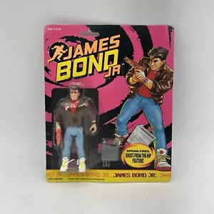 Figura de acción James Bond Jr 1991 Spring-Fired - nueva en caja coleccionable de colección - Imagen 1 de 6