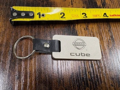 Llavero Llavero NISSAN CUBE Cuero Negro y Metal Satinado Foto 1 de 2