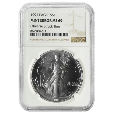 1991 $1 American Silver Eagle NGC MS69 Mint Error Obverse Strike Thru - Image 1 of 2