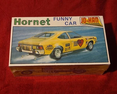Coche divertido Johan AMC Hornet de colección escala 1/25 sellado de fábrica  Foto 1 de 4