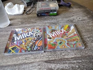 Mika-The Boy Who Knew Too Much(CD,2009) Mika- Life In Cartoon Motion(CD,2007) - Picture 1 of 4