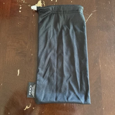 Bolso para gafas Oakley negro con cordón blanco Foto 1 de 4