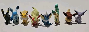 8 x Pokemon Eevee Evolution Bundle Tomy Vaporeon Jolteon Vintage Pvc Figures - Foto 1 di 17