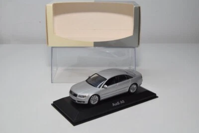 B38 1:43 MINICHAMPS AUDI A8 MJ 03 MET. RIVENDITORE GRIGIO ARGENTO NUOVO CON S... - Immagine 1 di 4