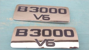 98-10 Mazda B3000 V6 fender emblem Badge Logo Nameplate Pair OEM - Picture 1 of 6