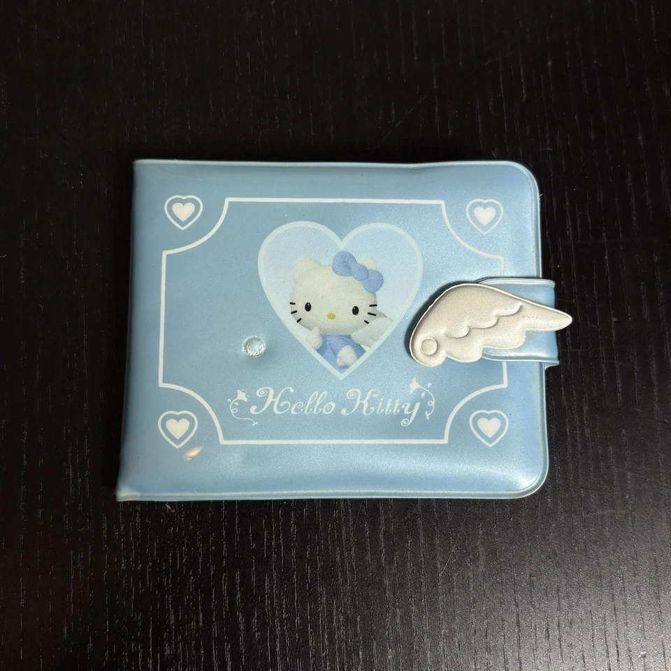 *DEFECTUOSO, LEER* Cartera Plegable de Plástico Azul HELLO KITTY Sanrio 1999 De Colección Foto 1 de 4