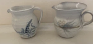 2 x Studio Pottery 1/2pint Jugs with Flower Design Height 9.5cms UNUSED - Picture 1 of 9