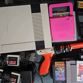 Nintendo Entertainment NES Bundle 9 games game genie cleaner gun 2 controllers