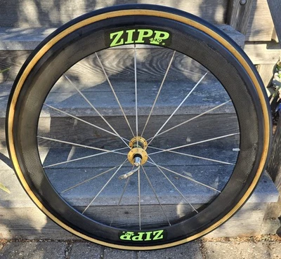 Rueda delantera tubular Zipp Carbon 440 700C 18 radios buje dorado neumático Vittoria Pro-Team Foto 1 de 4