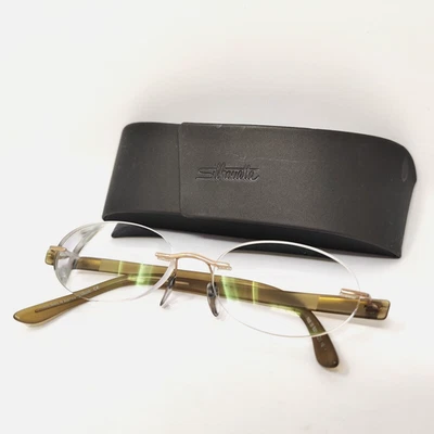 Silhouette 7608 20 6051 Gafas sin montura SOLO MARCOS con estuche dorado tostado []17 140 Foto 1 de 4