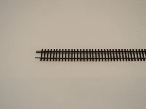 Tillig H0-H0m 85127 - Dreischienen-Flexgleis Länge 680 mm Neuware - Bild 1 von 1