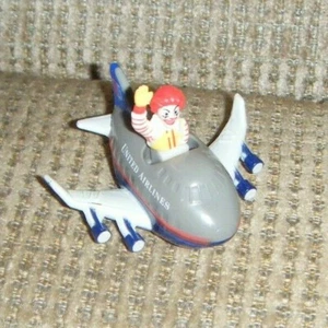 1991 RONALD IN UNITED AIRLINES AIRPLANE McDonald's Blue & Grey Plane Push Toy - Picture 1 of 1