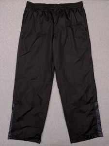 Pantalones deportivos Starter cortavientos para hombre grandes negros holgados con cremallera en el tobillo elásticos - Imagen 1 de 9