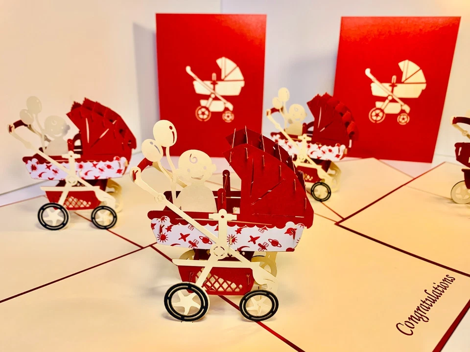 Tarjetas Pop Origami Cochecito Metálico Cochecito de Bebé en Rojo Recién Nacido Bebé 3D Tarjeta Pop Up Foto 1 de 4