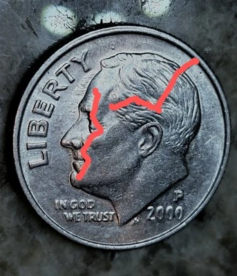 This is a 2000-P Roosevelt dime exhibiting a die break Error. - Image 1 of 4