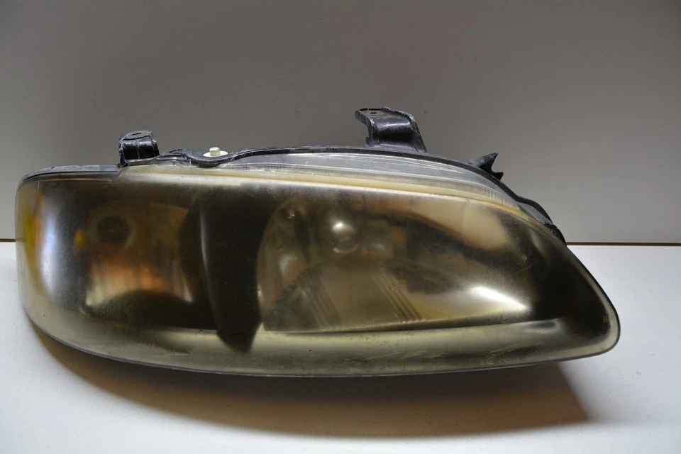 Nissan Sentra 2002-2003 luz de cabeza del lado derecho del pasajero OEM, 114-58896 Foto 1 de 4