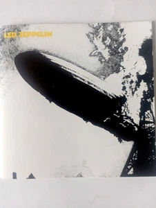 LED ZEPPELIN 1 CD WITH RARE YELLOW BAND LOGO+ INNER SLEEVE ROBERT PLANT IN WHITE - Foto 1 di 8