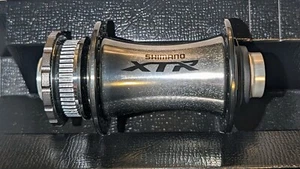 NOS SHIMANO XTR HB-M9010 FRONT DISC HUB 15 X 100 MM NIB - Bild 1 von 4