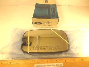 FORD 1985/1994 TEMPO & MERCURY TOPAZ "GLASS/CASE" R.H. OUTSIDE REARVIEW MIRROR - Picture 1 of 1
