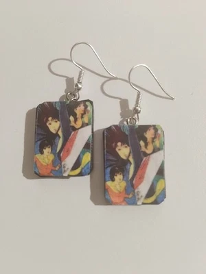 ORECCHINI IN FIMO FATTI A MANO CARTOON ANNI 80 OCCHI DI GATTO  - Immagine 1 di 3