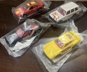 HOT WHEELS Getty Promo’s Lot-(4) Porsche, BMW 850i, Range Rover, Camaro SEALED!! - Bild 1 von 2