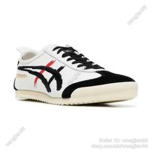 Sneakers unisex Onitsuka Tiger Mexico 66 Deluxe 1181A119-100 bianco/nero - Foto 1 di 8