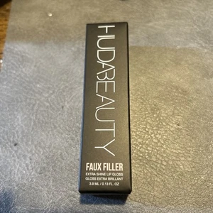 Huda Beauty Faux Filler Extra Shine Lip Gloss in COCO, Deep Brown, 3.9mL - Picture 1 of 3
