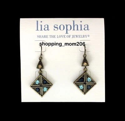Pendientes colgantes Lia Sophia "Azteca" tono dorado antiguo con cristales de corte azul Foto 1 de 3