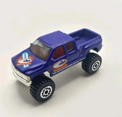 Chevrolet Silverado 1999 camioneta pickup vintage Matchbox 4x4 tabla de surf púrpura Foto 1 de 4