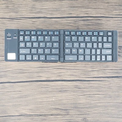 Geyes Foldable Bluetooth Gold Keyboard with Cord and Tablet Stand - Image 1 of 4